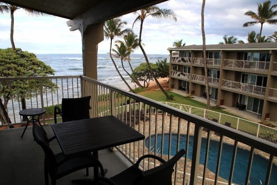 From the lanai looking out to the ocean past the pool