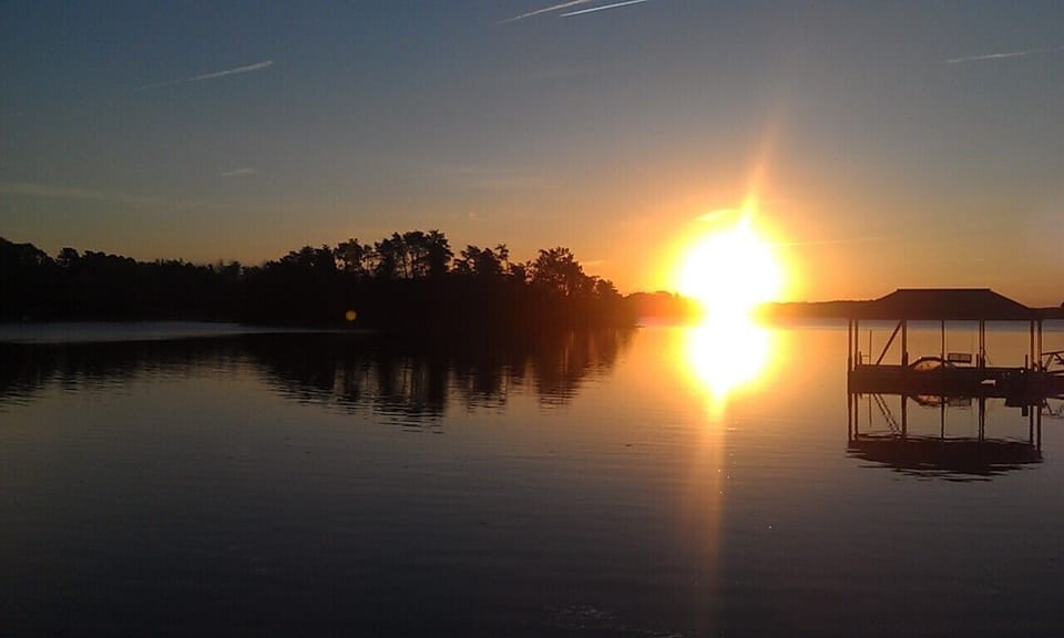 Beautiful sunrise over Lake Keowee, view from the dock