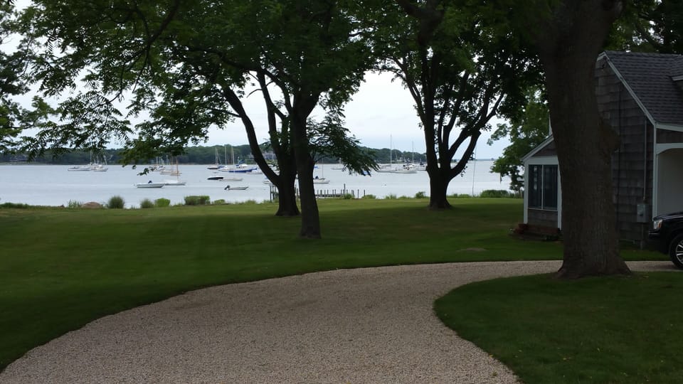 200 feet of waterfront. Easy to load cars in circular driveway