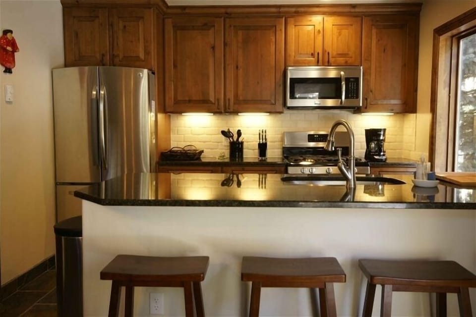 Kitchen with counter seating.