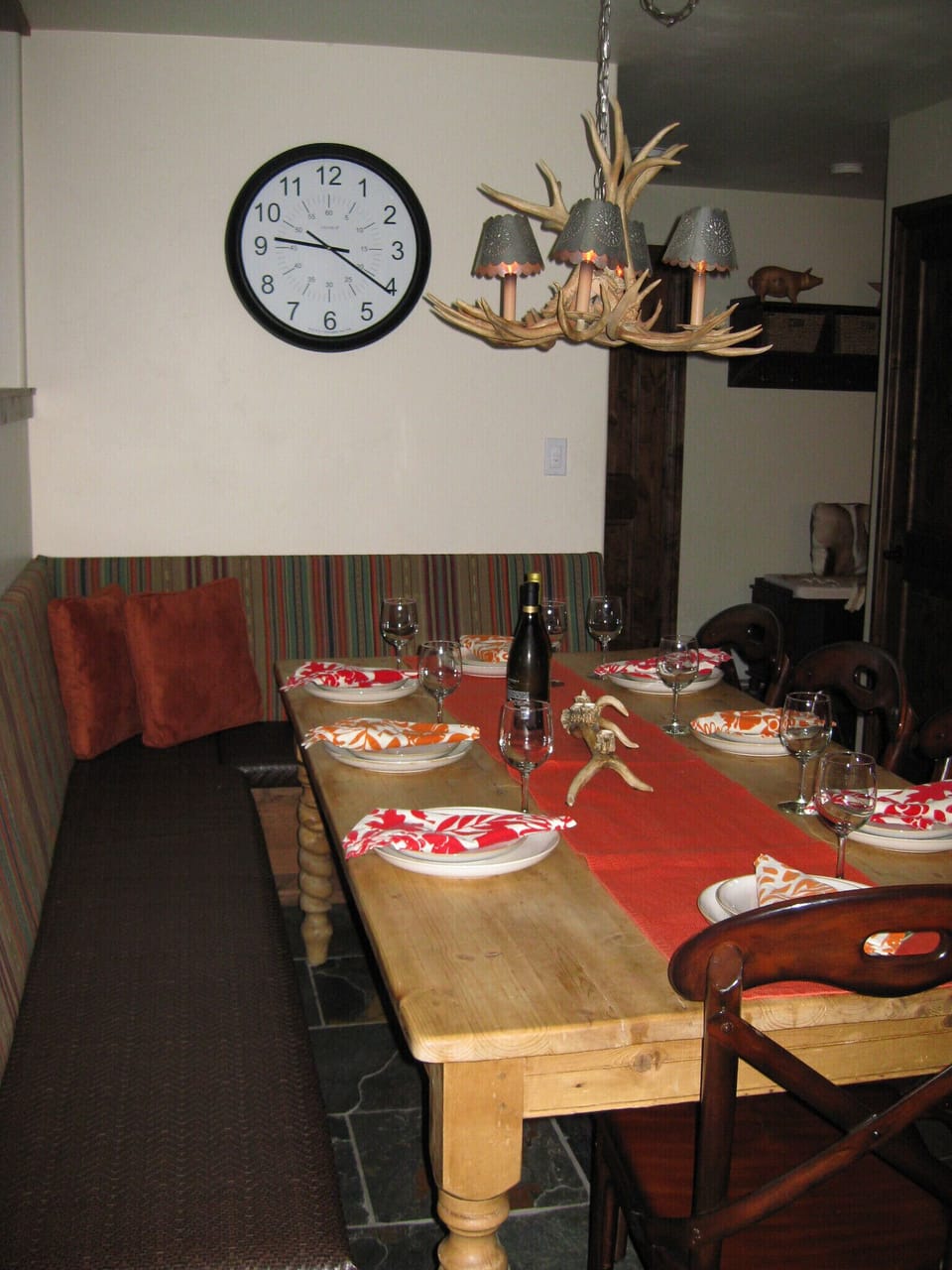 Dining table seats 8+ comfortably. Additional seating for 4 at counter.