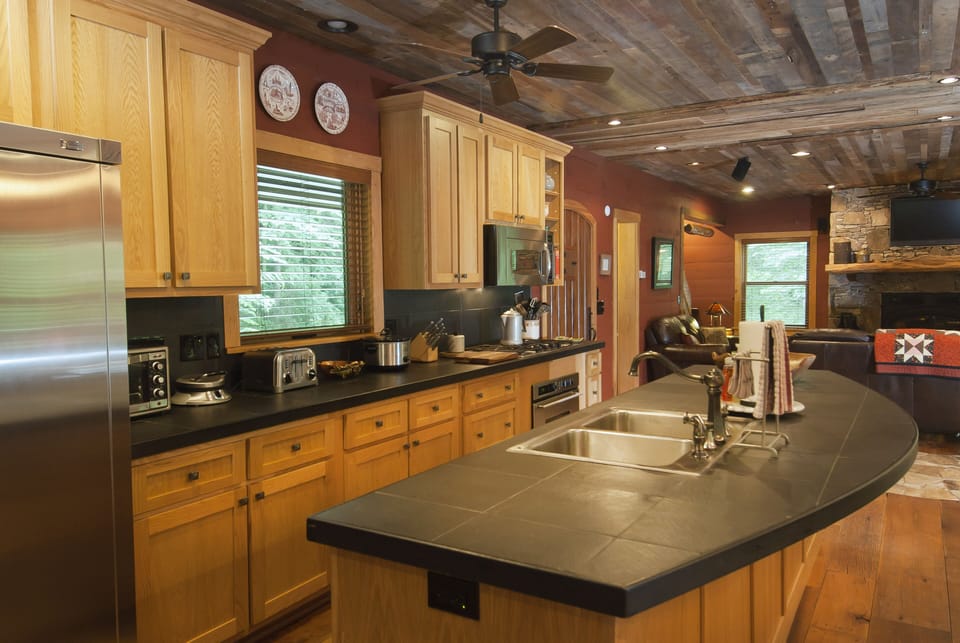 Our kitchen provides a comfortable place to cook.  It is well equipped!