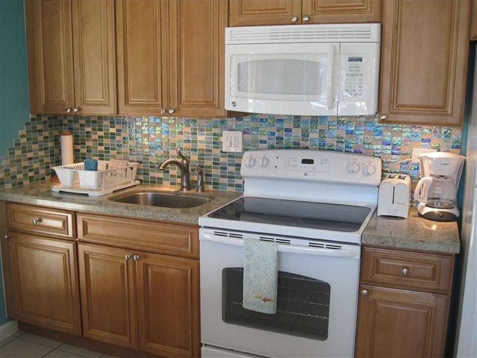 Well stocked kitchen with newer appliances
