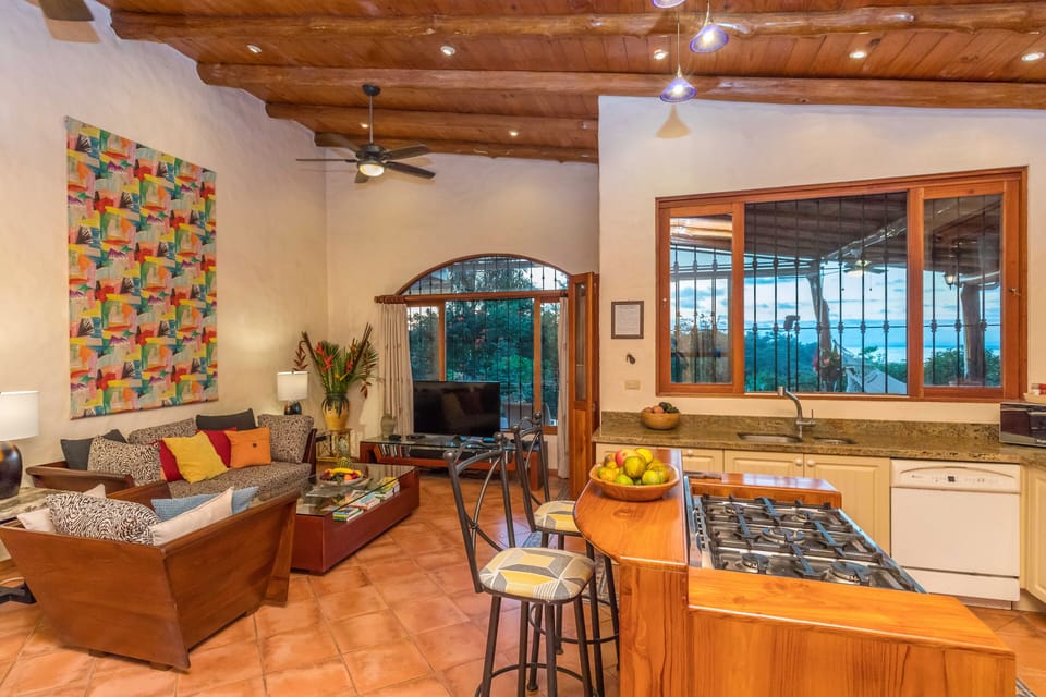 Kitchen, bar and living room
