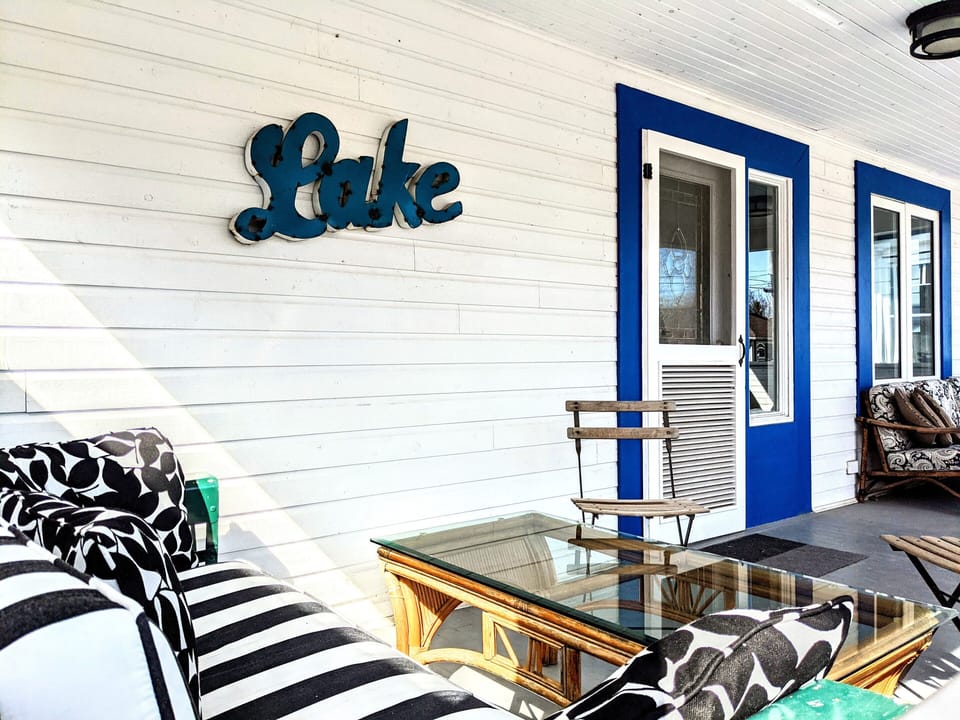 Covered porch with new lounge furniture. Enjoy your coffee and watch the sunrise