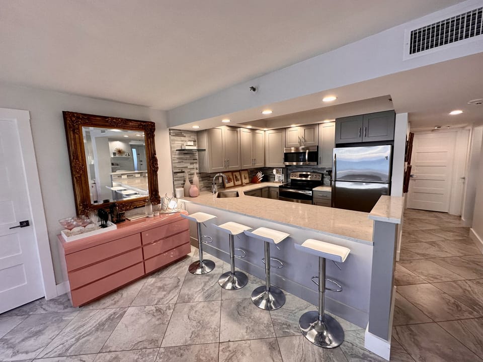 Chef’s kitchen open to the living and dining areas