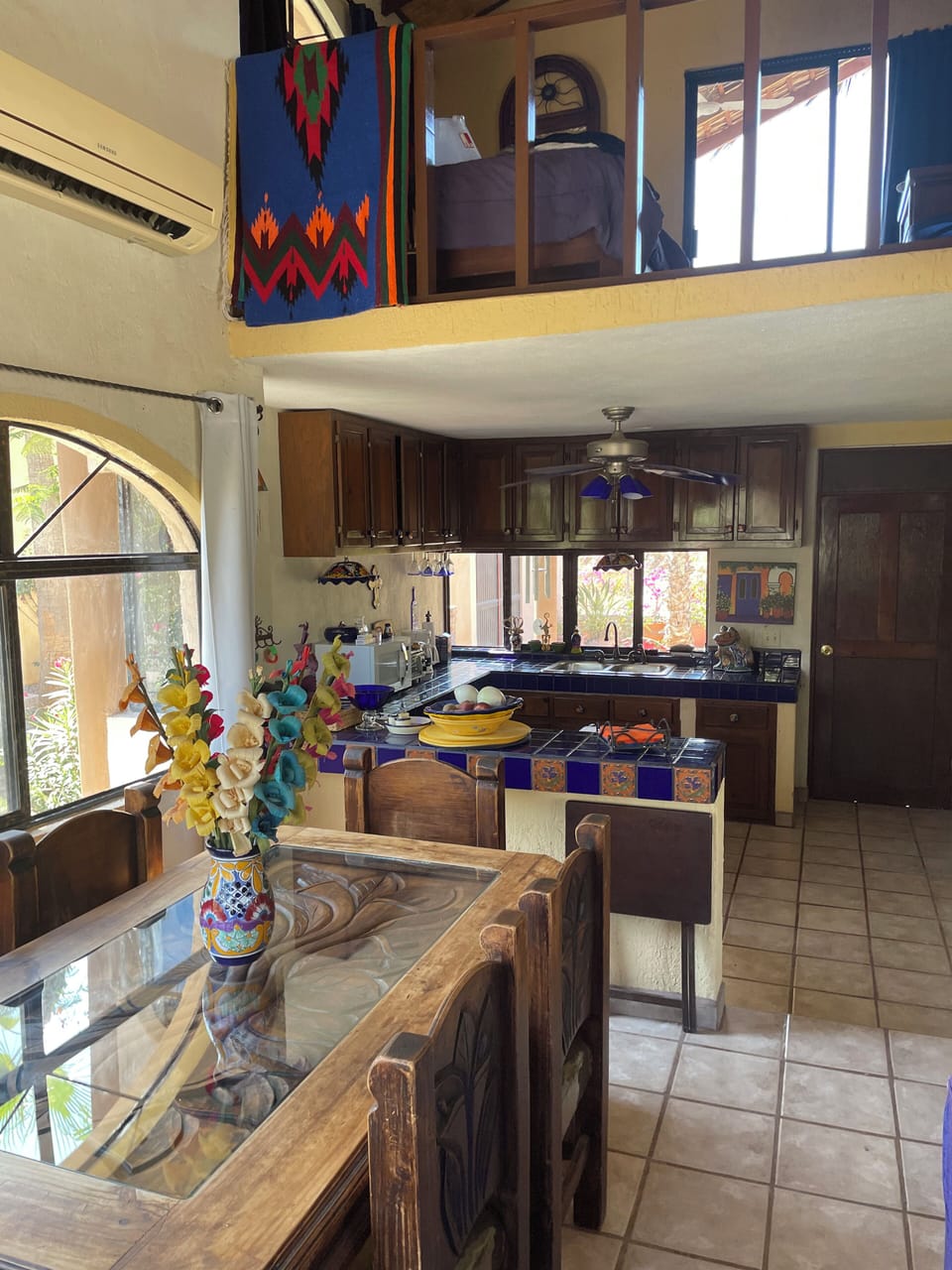 Dining table, Kitchen, and 2nd Floor Loft with 2 Twin Beds 