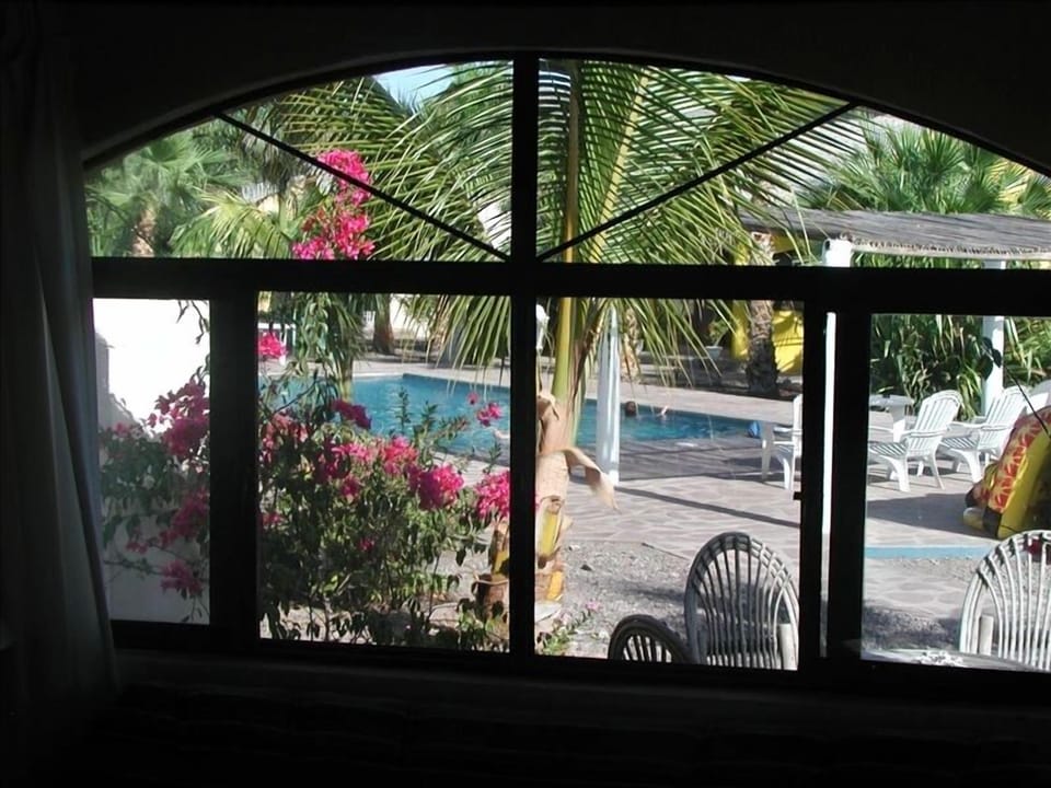 Swimming Pool is only steps away from front door - View from Living Room