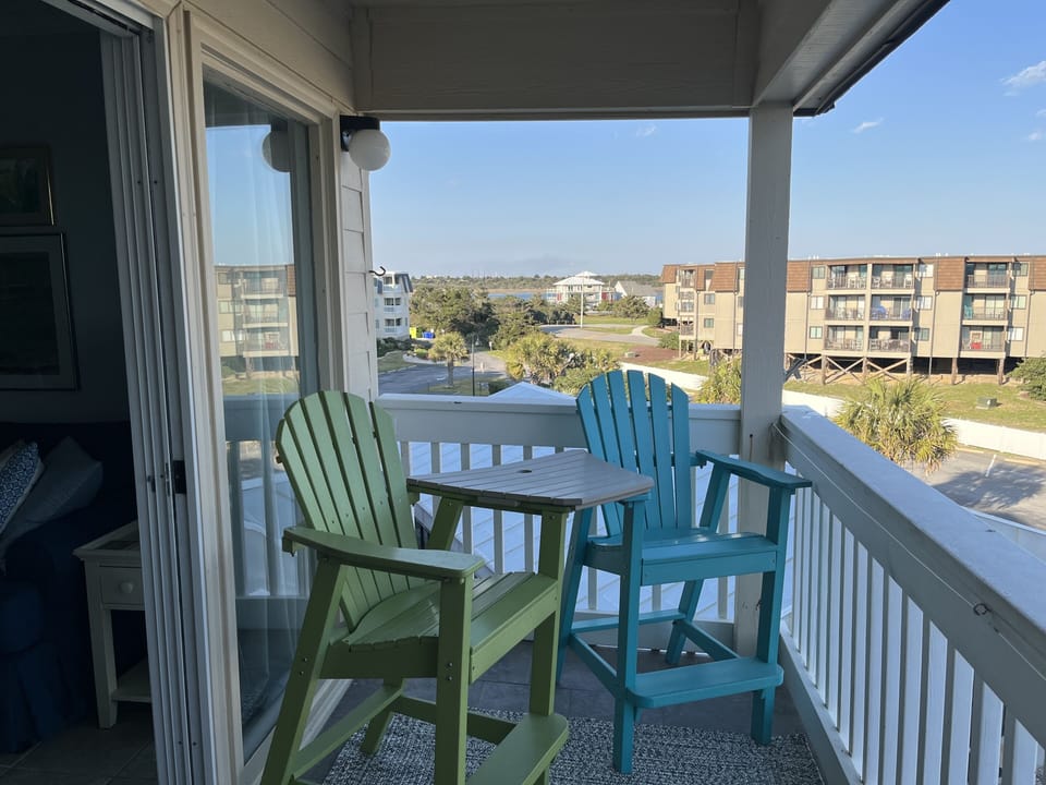 Balcony facing toward sound.  Sliding doors from living area and master bedroom.