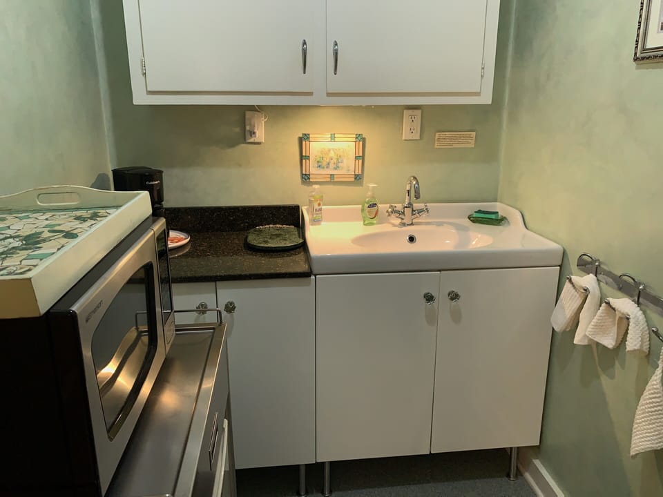 Arcata Stay's Rose Court Cottage equipped kitchenette including coffee and tea.
