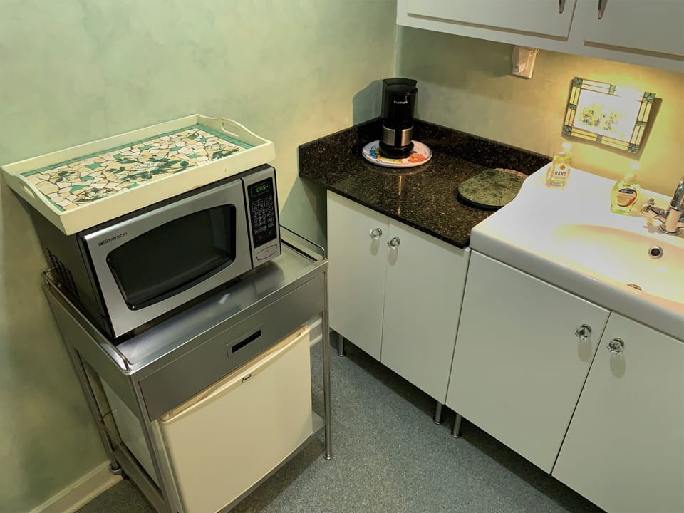 Arcata Stay's Rose Court Cottage equipped kitchenette including coffee and tea.
