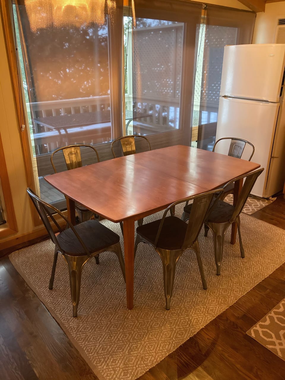Kitchen table comfortably seats six.