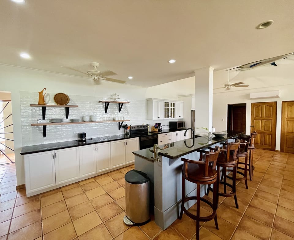 Large kitchen with bar seating 