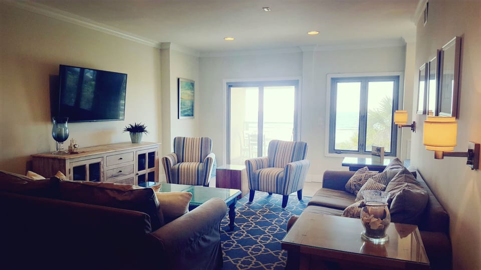 View the ocean from the kitchen, dining area and living room