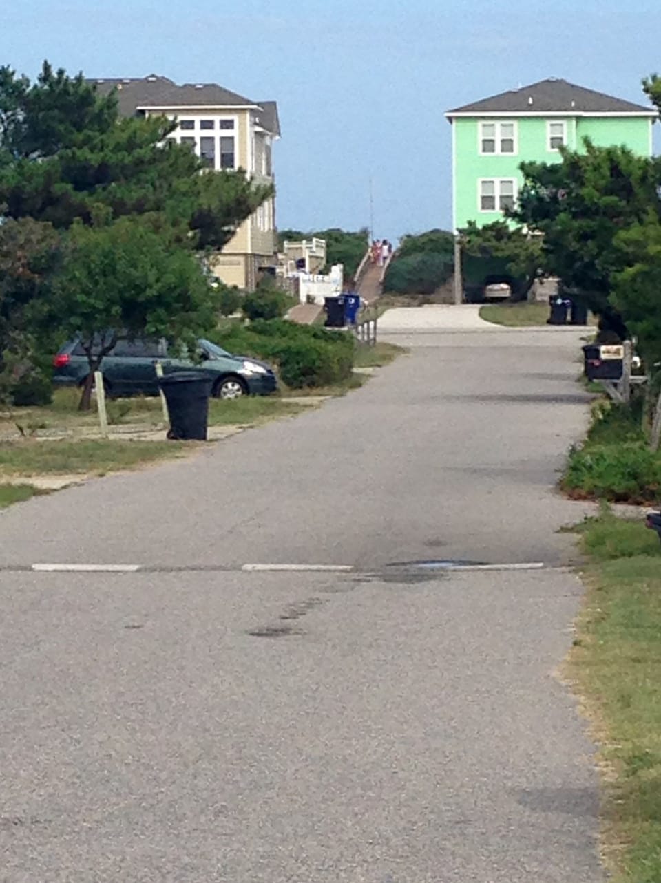 Taken from Driveway of Cottage. Beach access is to left of green cottage 