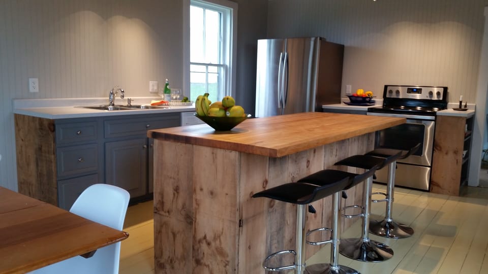 Century Old Wood from Reno wraps the Island