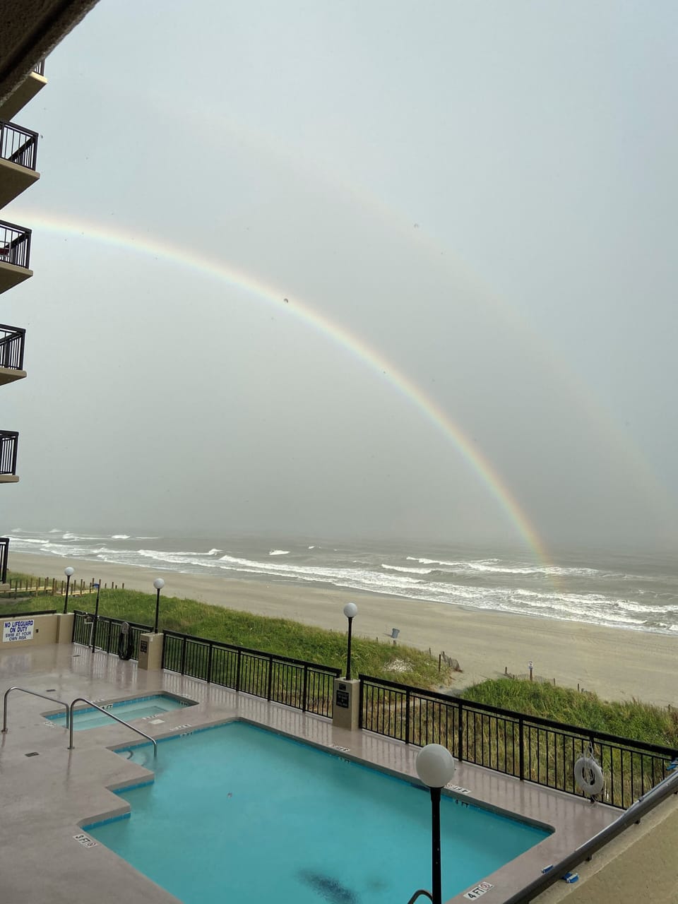Beautiful double rainbow after a storm. Know that there is no kiddie pool sadly