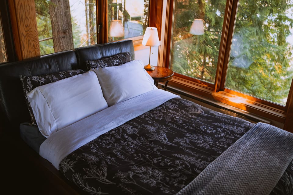 Sleep amongst the trees in the bright upstairs bedroom.