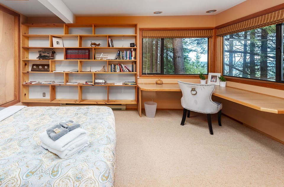 Bedroom #2: Darker in the mornings.  Books, Encyclopedias, and other toys
