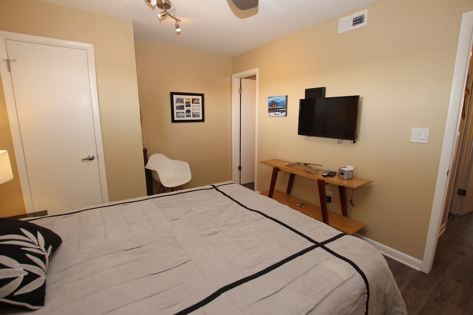 Ensuite bathroom is through the door to the left