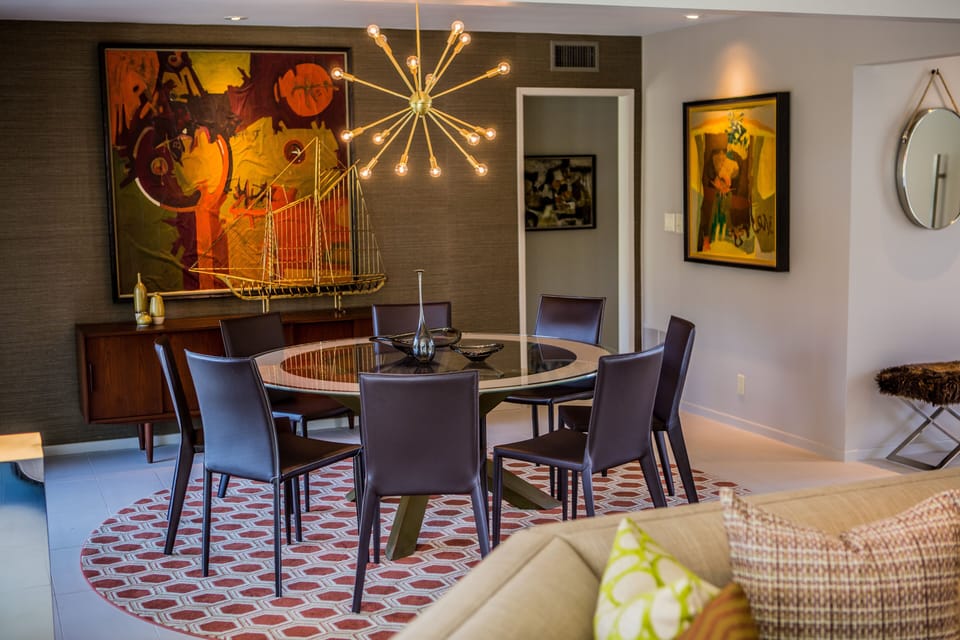 Round dining table for 8 (two additional chairs not shown)