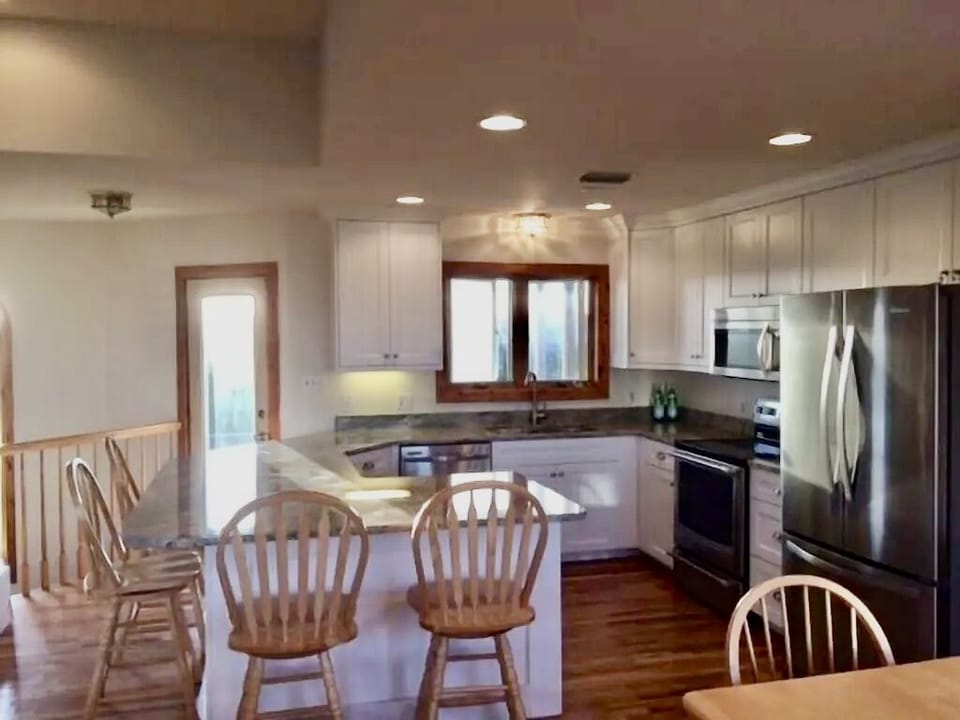  Top level gourmet kitchen. Door shown leads to screen porch w/ picnic table. 