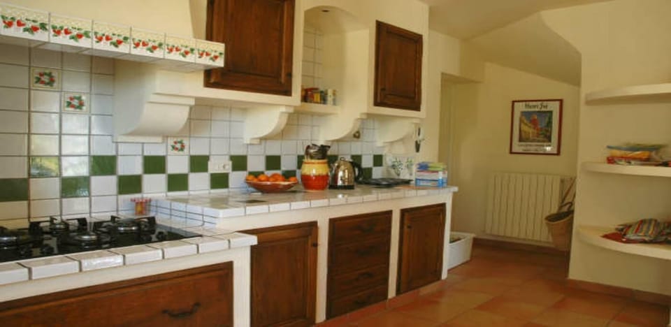 Lots of counter space and storage. Dining room door is to right.