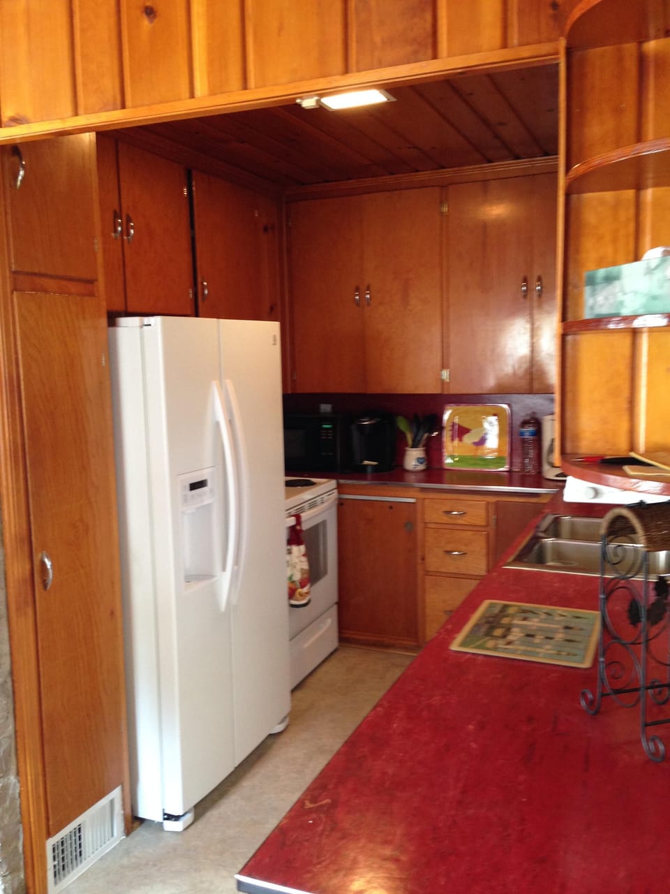 Kitchen, with doublewide refrigerator,  updated stove and dishwasher.