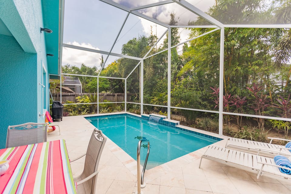 New heated pool with screen enclosure