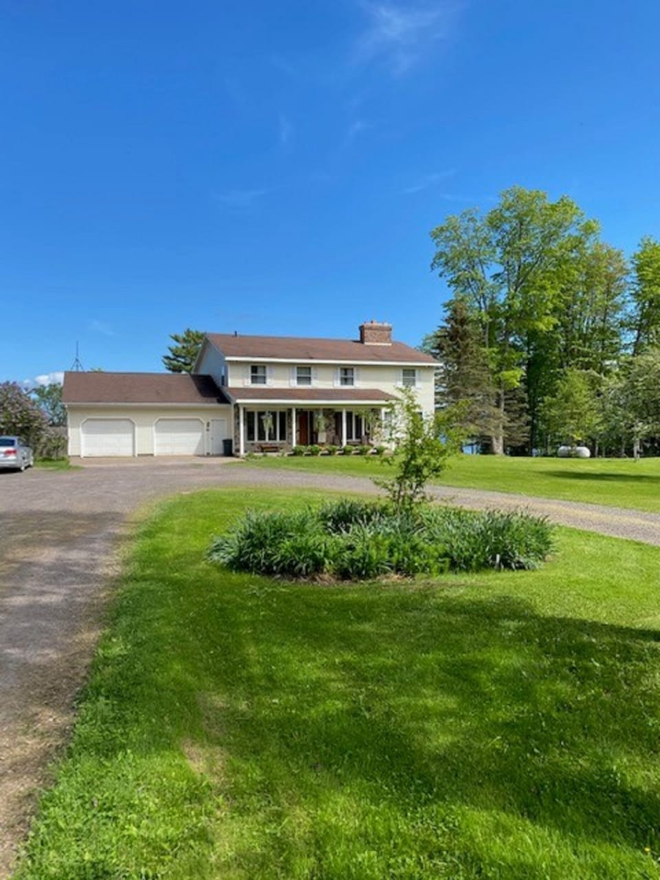 Front driveway with open parking to left (not shown)