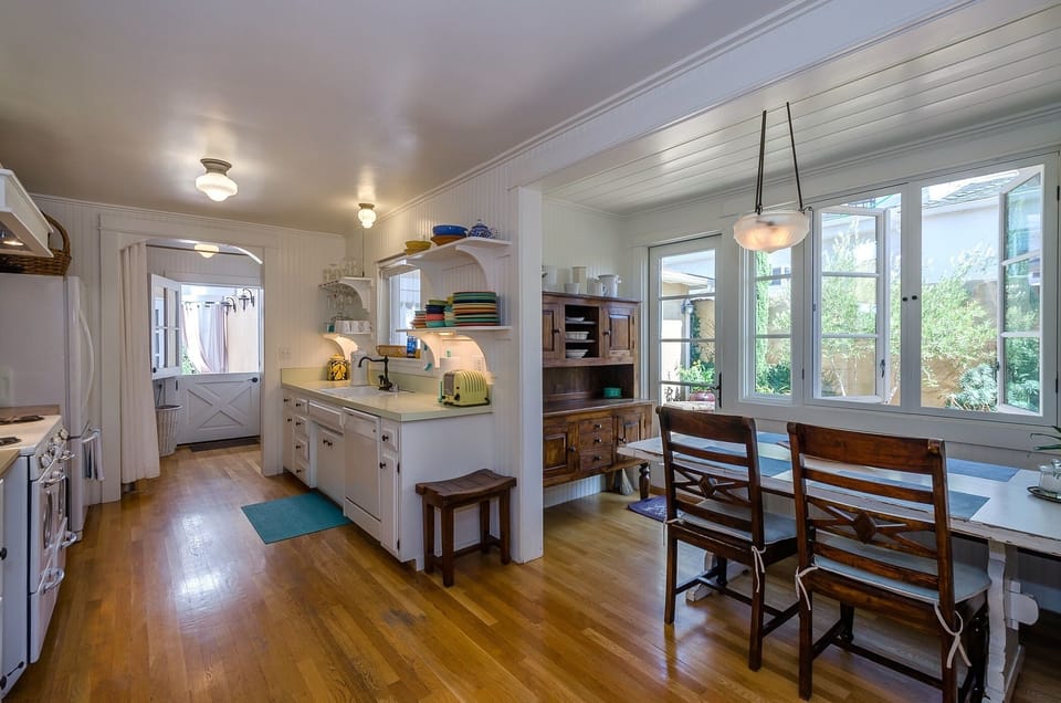 Open kitchen with large farmhouse dining table