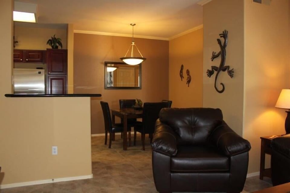 Comfortable furniture with southwestern accents throughout condo.
