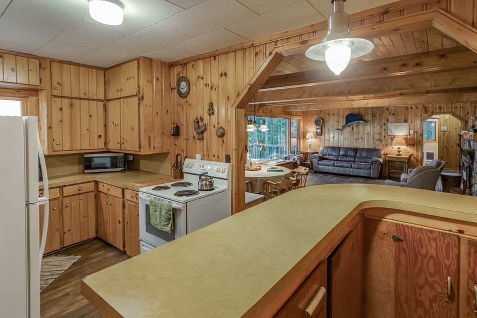 Kithchen is turnkey with dishes, utensils pots and pans, microwave & coffee pot