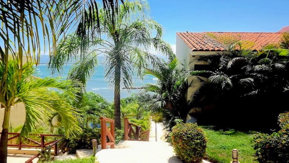 Steps to the Pools/Beach/Restaurant from Coral 7 Entrance


