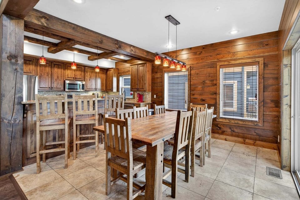 Dining room with seating for 8, additional 3 seats at the breakfast bar
