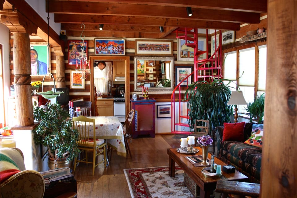 The Living Room at Casa Carmen! Windows line the room with beautiful scenery...
