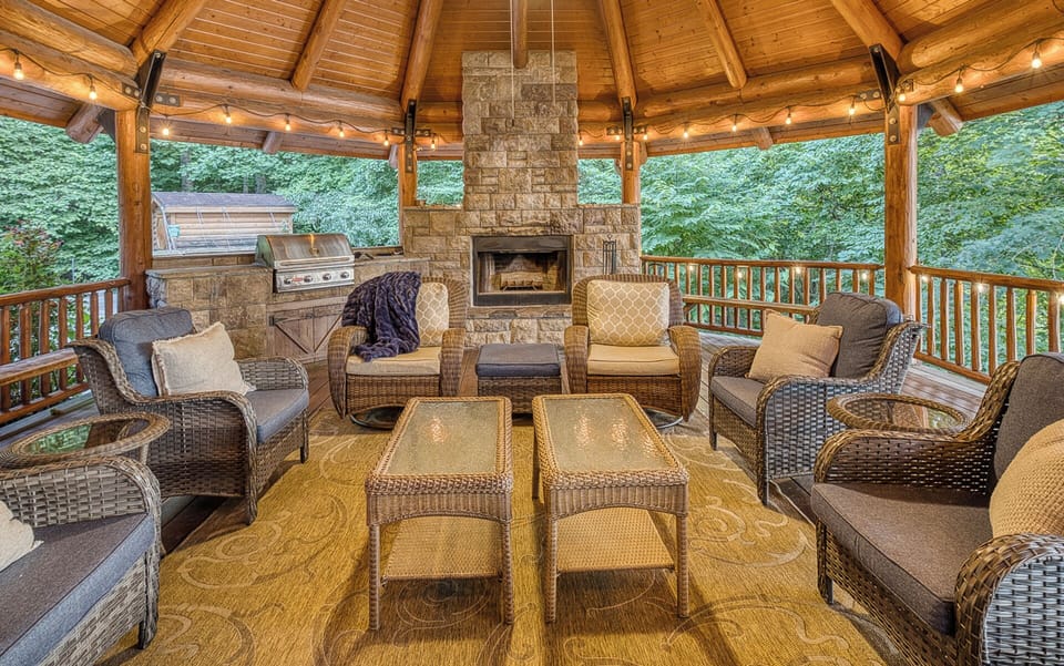 Cozy up and enjoy hanging out by the outside fire while grilling your favorite meals!
