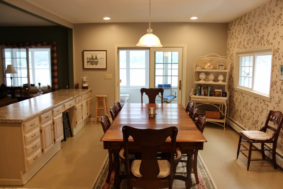 Open kitchen and dining room with spectacular lake views.