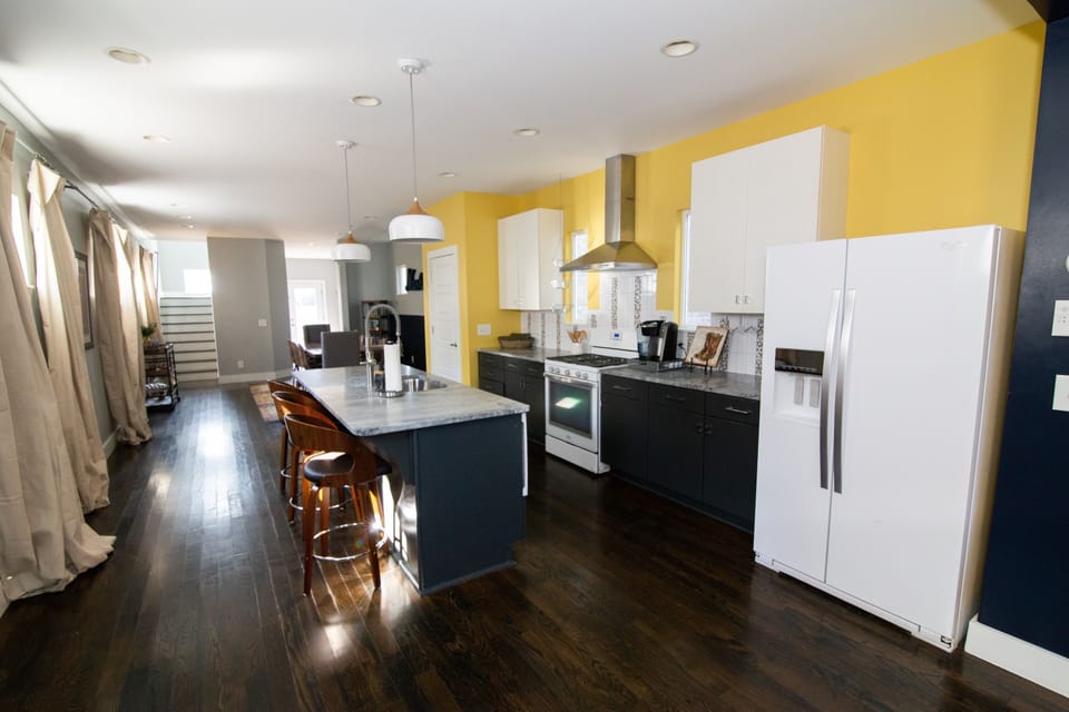 Fun open floor plan kitchen stocked with all you need for you visit!