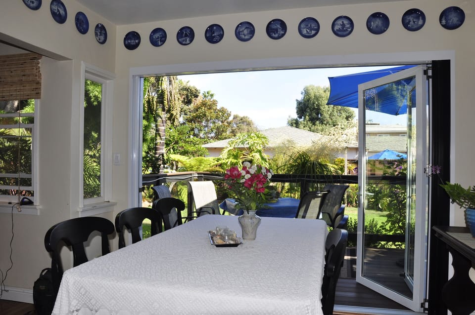 Dining room spills onto deck.
