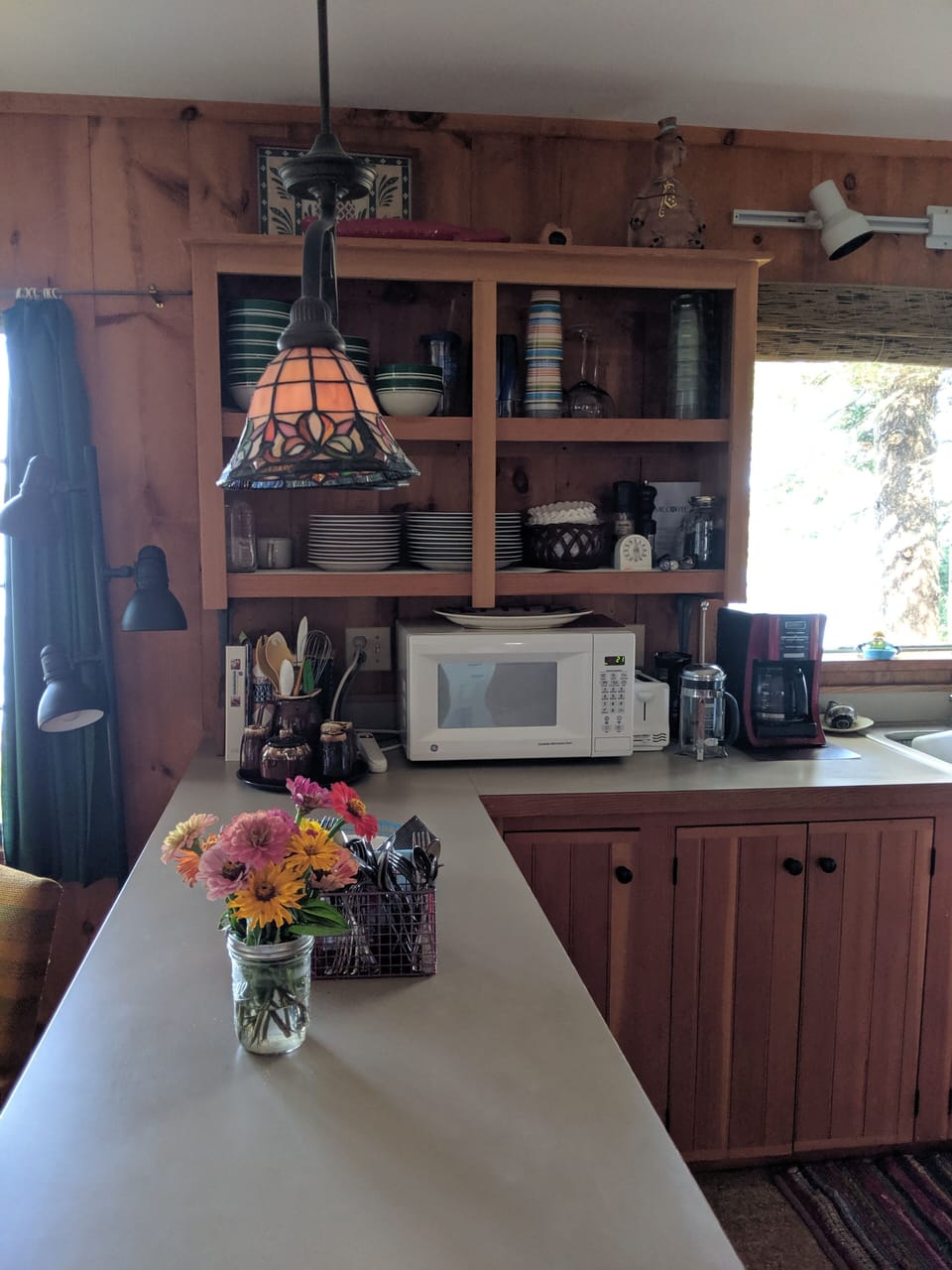 microwave, coffee grinder and maker