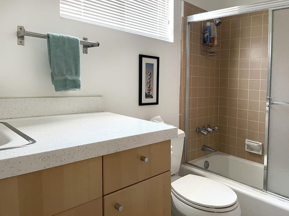 Bright and airy bathroom with vintage charm and natural light