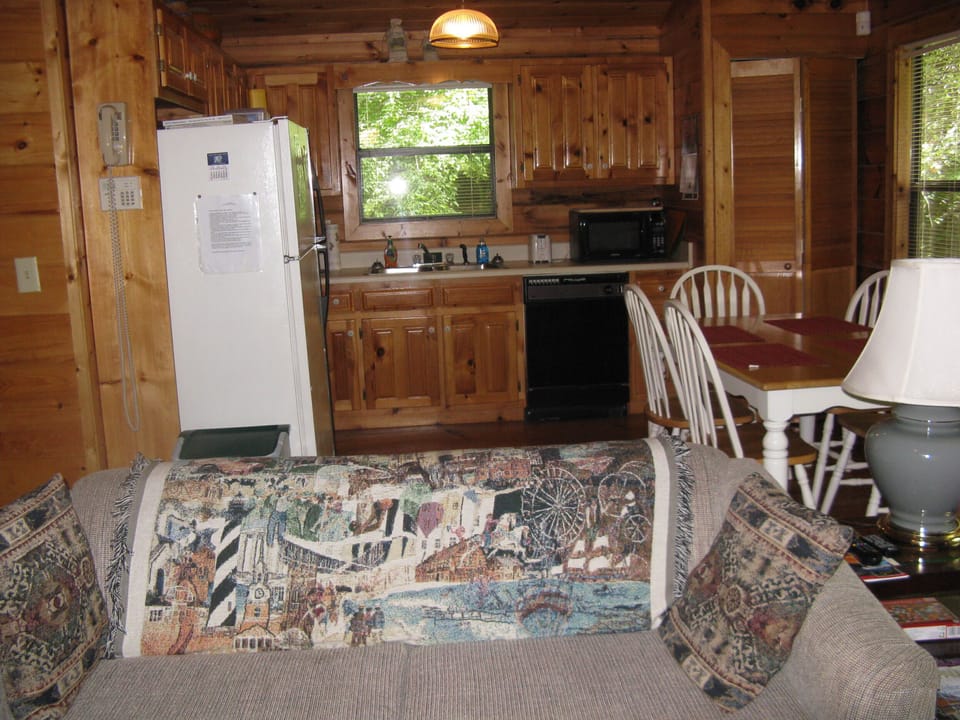 Comfy great room adjoins the fully equipped kitchen.