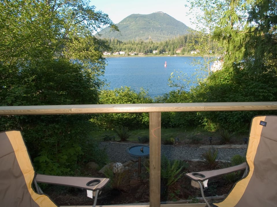 Suite has its own deck with BBQ and view of the water; hot tub is just to the left.