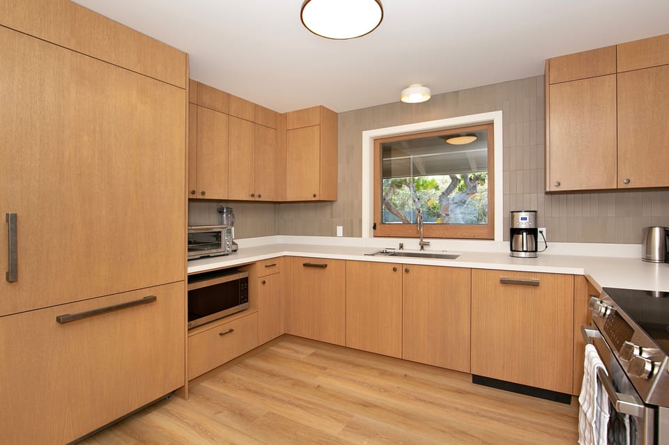 Kitchen, with Fridge to Left, and Window to Mauka Lanai