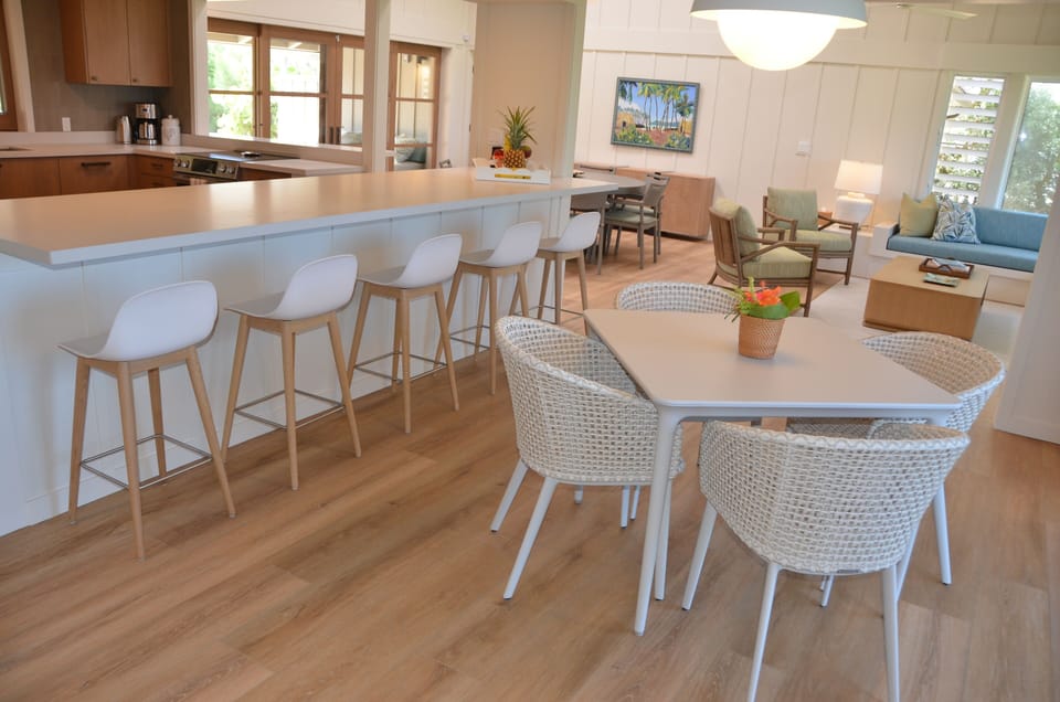 Breakfast Bar and Game Table looking toward Dining Table and Living Room