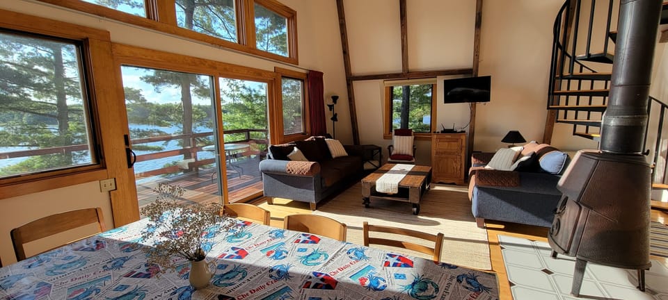 The great room makes for nice family gathering.  Spiral stairs up to bedroom 3.