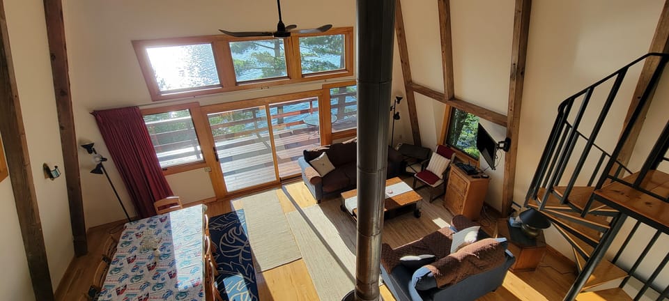 A view of the great room from the upstairs balcony.