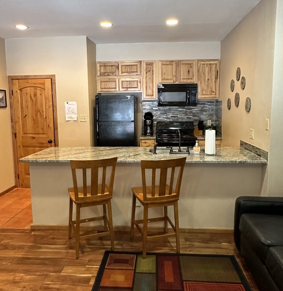 Granite counter tops. Drip coffee maker, filters provided.