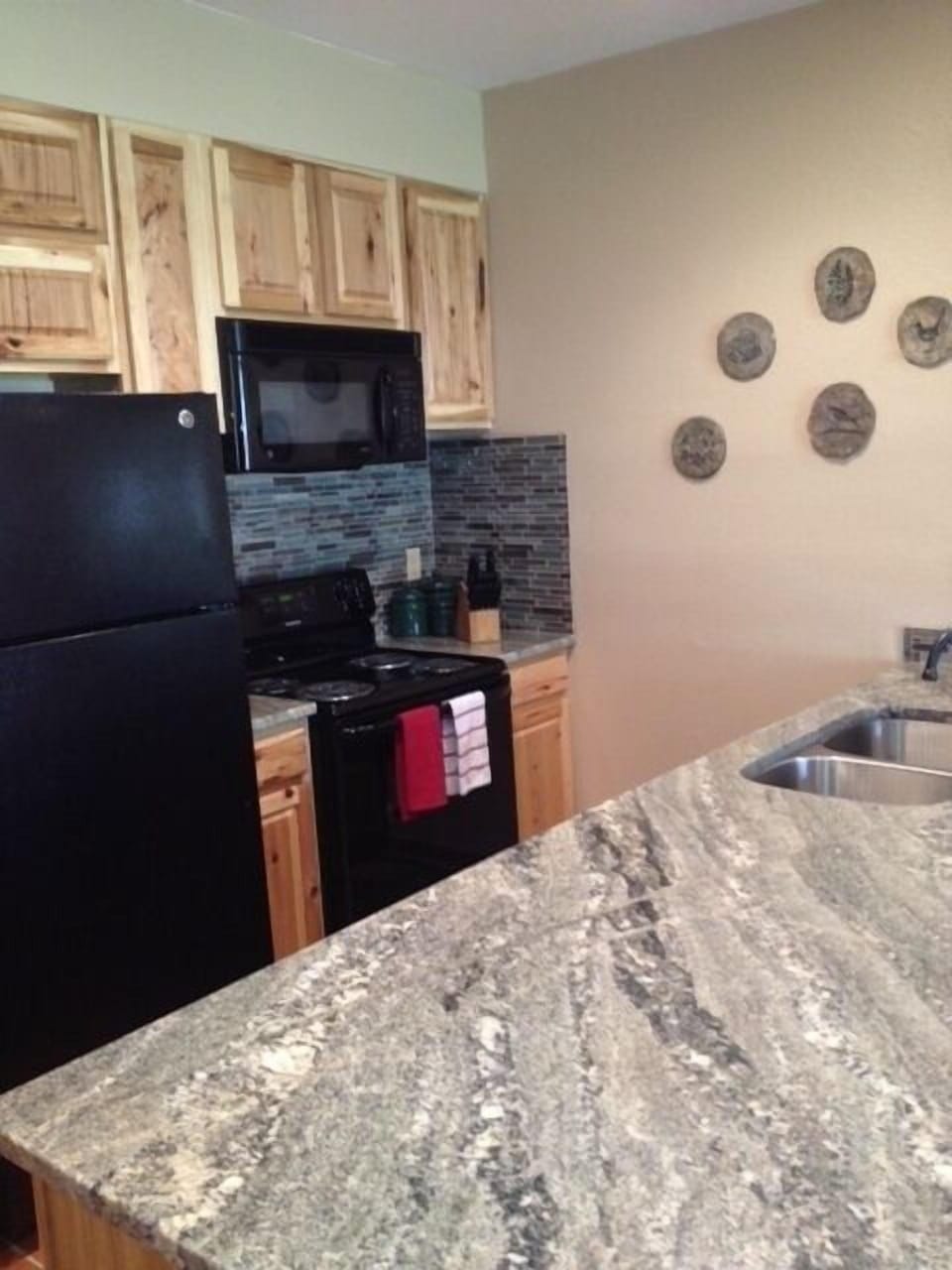Kitchen is fully stocked with pots, pans, plates, glasses, etc. (Crock pot too!)